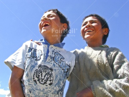 Fair Trade Photo 5 -10 years, Activity, Care, Casual clothing, Clothing, Colour image, Cooperation, Day, Emotions, Friendship, Happiness, Horizontal, Latin, Looking away, Low angle view, Outdoor, People, Peru, Portrait halfbody, Smiling, South America, Together, Two boys, Two children