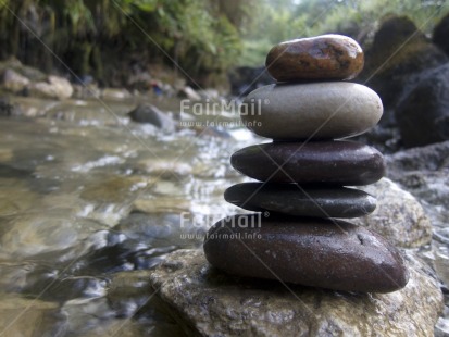 Fair Trade Photo Balance, Colour image, Flower, Focus on foreground, Horizontal, Nature, Outdoor, Peru, River, South America, Spirituality, Stone, Tabletop, Water, Wellness