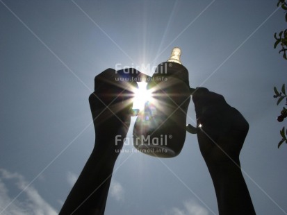 Fair Trade Photo Backlit, Birth, Colour image, Food and alimentation, Hand, Horizontal, New baby, Outdoor, Peru, Silhouette, South America, Sun, Tabletop