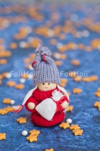 Fair Trade Photo Activity, Adjective, Blue, Celebrating, Christmas, Christmas decoration, Colour, Doll, Object, Present, Red, Star, Vertical, Yellow