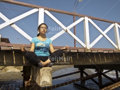 Fair Trade Photo 15-20 years, Activity, Beach, Casual clothing, Clothing, Colour image, Day, Horizontal, Latin, Meditating, One girl, Outdoor, People, Peru, Seasons, South America, Summer, Wellness, Yoga