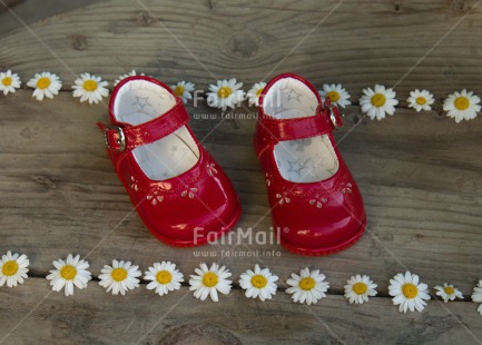 Fair Trade Photo Birth, Closeup, Colour image, Daisy, Flower, Girl, Horizontal, New baby, People, Peru, Red, Shoe, South America