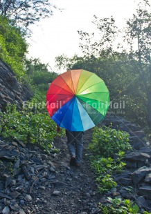 Fair Trade Photo Activity, Colour image, Confirmation, One child, Outdoor, Peru, Rural, South America, Travel, Umbrella, Vertical, Walking