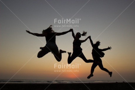 Fair Trade Photo Activity, Beach, Colour image, Evening, Friendship, Group of children, Horizontal, Jumping, People, Shooting style, Silhouette, Summer, Sunset