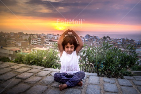 Fair Trade Photo Activity, Colour image, Evening, Horizontal, Meditating, One girl, Outdoor, Peace, People, Spirituality, Sunset, Wellness, Yoga