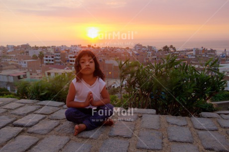 Fair Trade Photo Activity, Colour image, Evening, Horizontal, Meditating, One girl, Outdoor, Peace, People, Spirituality, Sunset, Wellness, Yoga