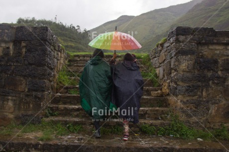 Fair Trade Photo Activity, Colour image, Friendship, Horizontal, Peru, Rain, Rural, Scenic, South America, Together, Umbrella, Walking