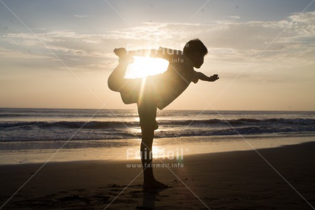 Fair Trade Photo Beach, Colour image, Horizontal, One boy, People, Peru, Sea, Silhouette, South America, Sunset, Yoga