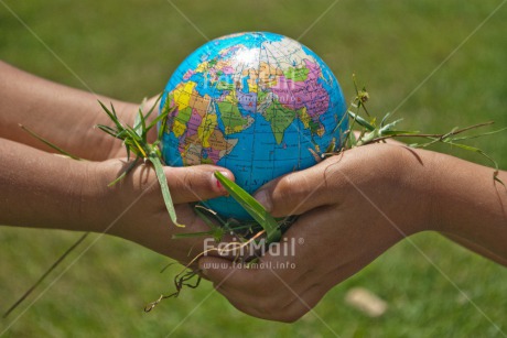 Fair Trade Photo Caring, Christmas, Closeup, Colour image, Cooperation, Environment, Globe, Hand, Horizontal, People, Peru, Sharing, Shooting style, South America, Sustainability, Together, Two children, Values, World