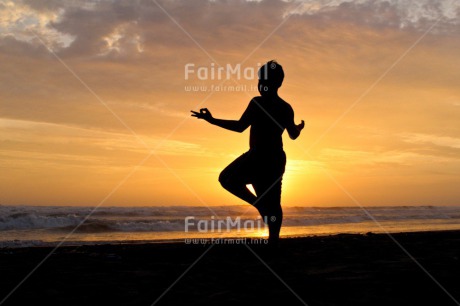 Fair Trade Photo Activity, Beach, Colour image, Colourful, Doing yoga, Emotions, Evening, Happiness, Horizontal, Light, One person, Outdoor, People, Peru, Relax, Relaxing, Shooting style, Silhouette, Sky, South America, Standing, Strength, Success, Sun, Sunset, Yoga