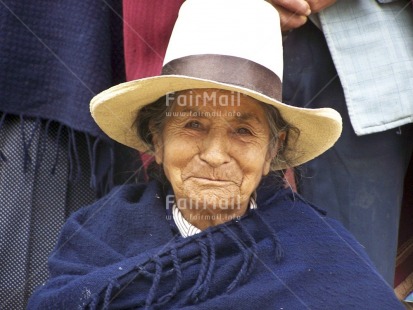 Fair Trade Photo Activity, Clothing, Colour image, Day, Hat, Horizontal, Looking at camera, Old age, One woman, Outdoor, People, Peru, Portrait headshot, Rural, Sitting, Smiling, South America, Traditional clothing, Wisdom