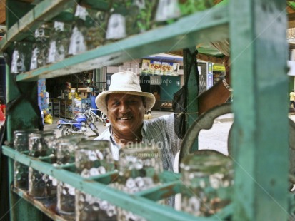 Fair Trade Photo Activity, Colour image, Entrepreneurship, Food and alimentation, Horizontal, Looking at camera, Market, Multi-coloured, One man, Outdoor, People, Peru, Portrait headshot, Smile, Smiling, South America, Streetlife, Working