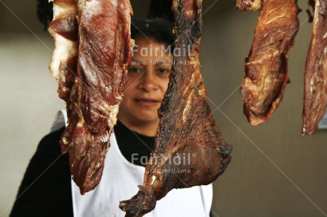 Fair Trade Photo Activity, Colour image, Entrepreneurship, Focus on foreground, Food and alimentation, Horizontal, Looking at camera, Market, Meat, One woman, People, Peru, Portrait halfbody, South America