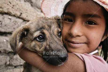 Fair Trade Photo 5 -10 years, Activity, Animals, Care, Colour image, Cute, Day, Dog, Friendship, Horizontal, Hugging, Latin, Looking at camera, Love, One girl, Outdoor, People, Peru, Portrait headshot, South America