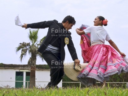 Fair Trade Photo Black, Clothing, Colour image, Dance, Dancing, Ethnic-folklore, Festivals and Performances, Horizontal, Love, Marinera, Marriage, One man, One woman, Outdoor, People, Peru, Pink, South America, Traditional clothing, Travel
