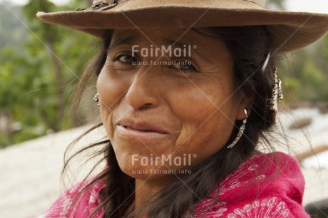 Fair Trade Photo Activity, Clothing, Colour image, Dailylife, Hat, Horizontal, Looking at camera, Multi-coloured, One woman, Outdoor, People, Peru, Portrait headshot, Rural, Smile, Smiling, Sombrero, South America, Traditional clothing