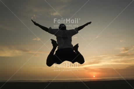 Fair Trade Photo Activity, Backlit, Beach, Colour image, Emotions, Happiness, Horizontal, Jumping, One boy, Outdoor, People, Peru, Portrait fullbody, Silhouette, South America, Sport, Sun, Sunset