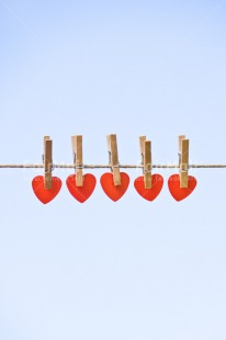 Fair Trade Photo Blue, Chachapoyas, Colour image, Friendship, Hanging wire, Heart, Love, Marriage, Mothers day, Peg, Peru, Red, South America, Thinking of you, Valentines day, Vertical, Wedding