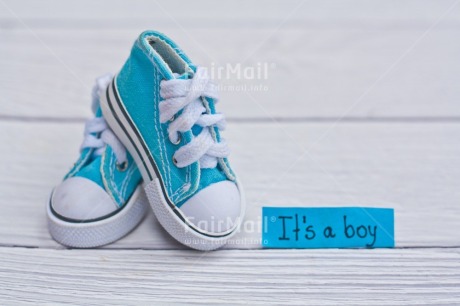 Fair Trade Photo Baby, Birth, Blue, Boy, Clothing, Colour, Horizontal, New baby, Object, People, Pregnant, Shoe, Text