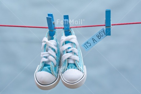 Fair Trade Photo Baby, Birth, Blue, Boy, Clothing, Colour, Horizontal, New baby, Object, People, Pregnant, Shoe, Text