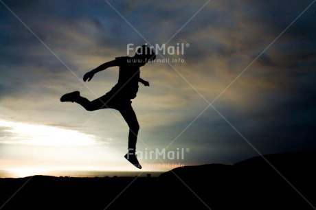 Fair Trade Photo Activity, Beach, Colour image, Colourful, Emotions, Evening, Happiness, Horizontal, Jumping, Light, One person, Outdoor, People, Peru, Sea, Shooting style, Silhouette, Sky, South America, Strength, Success, Sun, Sunset