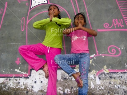 Fair Trade Photo 5 -10 years, Activity, Casual clothing, Clothing, Colour image, Day, Green, Horizontal, Latin, Low angle view, Outdoor, People, Peru, Pink, South America, Two girls, Yoga