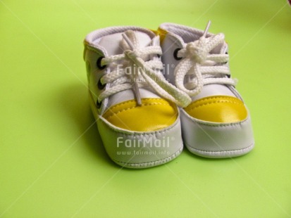 Fair Trade Photo Birth, Colour image, Green, Horizontal, New baby, Peru, Shoe, South America, Studio, Yellow