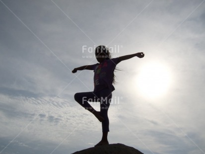 Fair Trade Photo Activity, Backlit, Clouds, Colour image, Day, Horizontal, Low angle view, One girl, Outdoor, People, Peru, Silhouette, South America, Yoga