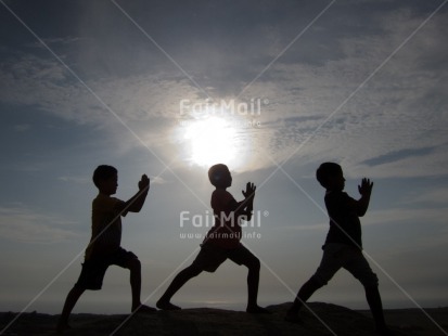 Fair Trade Photo Activity, Backlit, Blue, Clouds, Colour image, Group of boys, Horizontal, Outdoor, People, Peru, Silhouette, Sky, South America, Sunset, Yoga