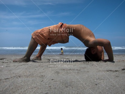 Fair Trade Photo Activity, Beach, Colour image, Day, Horizontal, Outdoor, People, Perspective, Peru, Sand, Sea, South America, Two boys, Water, Yoga