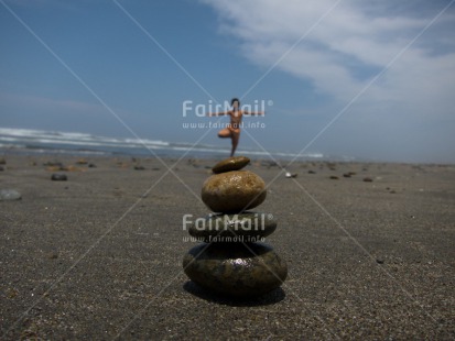 Fair Trade Photo Activity, Balance, Beach, Colour image, Horizontal, One boy, Outdoor, People, Perspective, Peru, Sand, South America, Stone, Summer, Yoga