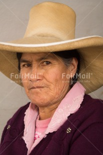 Fair Trade Photo 60-65 years, Activity, Colour image, Hat, Latin, Looking at camera, One woman, People, Peru, Sombrero, South America, Vertical