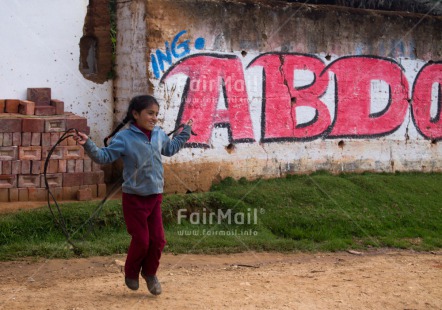 Fair Trade Photo Activity, Colour image, Day, Horizontal, Jumping, Latin, One girl, Outdoor, People, Peru, Playing, Rural, South America