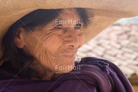 Fair Trade Photo Activity, Colour image, Day, Hat, Horizontal, Latin, Looking away, Old age, One woman, Outdoor, People, Peru, Portrait headshot, Rural, Smiling, Sombrero, South America
