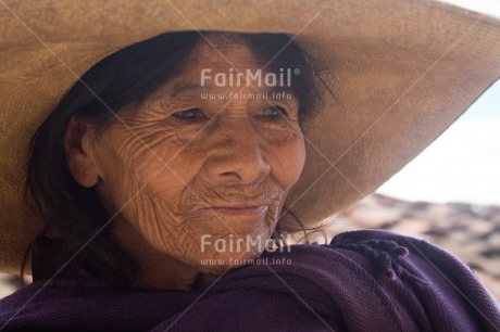 Fair Trade Photo Activity, Colour image, Day, Hat, Horizontal, Latin, Looking away, Old age, One woman, Outdoor, People, Peru, Portrait headshot, Rural, Smiling, Sombrero, South America