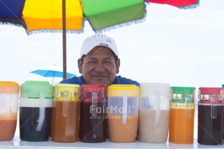 Fair Trade Photo 35-40 years, Activity, Colour image, Entrepreneurship, Food and alimentation, Horizontal, Latin, Looking at camera, One man, People, Peru, Portrait headshot, Selling, Smiling, South America, Summer