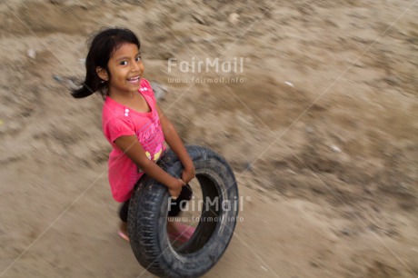 Fair Trade Photo Activity, Colour image, Emotions, Happiness, Horizontal, Looking at camera, One child, One girl, Outdoor, People, Peru, Playing, Smiling, South America