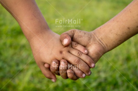 Fair Trade Photo Activity, Closeup, Colour image, Day, Friendship, Grass, Hand, Holding hands, Horizontal, Love, Outdoor, People, Peru, Shooting style, South America, Together, Two children