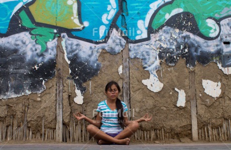 Fair Trade Photo Activity, Colour image, Graffity, Health, Horizontal, Meditating, One girl, Outdoor, Peace, People, Peru, South America, Urban, Wellness, Yoga