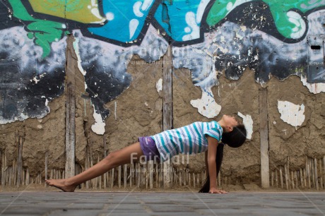 Fair Trade Photo Activity, Colour image, Graffity, Health, Horizontal, Meditating, One girl, Outdoor, Peace, People, Peru, South America, Urban, Wellness, Yoga