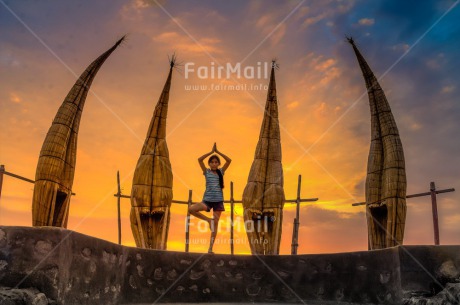 Fair Trade Photo Balance, Colour image, Evening, Fishing boat, Horizontal, Huanchaco, One girl, Outdoor, Peace, People, Peru, Sky, South America, Spirituality, Wellness, Yoga, Youth