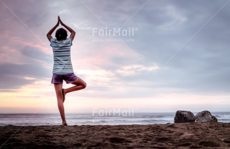 Fair Trade Photo Balance, Beach, Colour image, Evening, Horizontal, One girl, Outdoor, Peace, People, Sea, Sky, Spirituality, Wellness, Yoga, Youth