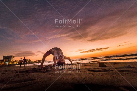 Fair Trade Photo Balance, Beach, Colour image, Evening, Horizontal, One girl, Outdoor, Peace, People, Sea, Seasons, Sky, Spirituality, Summer, Wellness, Yoga, Youth