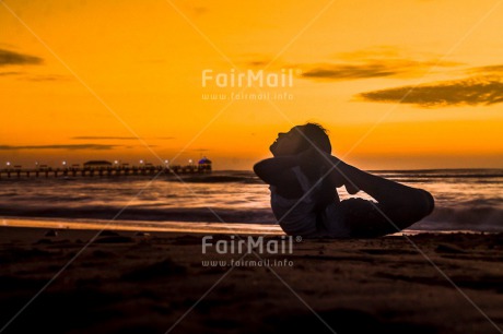 Fair Trade Photo Balance, Beach, Colour image, Evening, Horizontal, One girl, Outdoor, Peace, People, Sea, Seasons, Sky, Spirituality, Summer, Wellness, Yoga, Youth