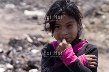 Fair Trade Photo Activity, Colour image, Garbage belt, Horizontal, Looking at camera, One girl, People, Peru, Portrait halfbody, Poverty, Smiling, South America