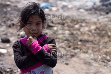 Fair Trade Photo Activity, Colour image, Garbage belt, Horizontal, Looking at camera, One girl, People, Peru, Portrait halfbody, Poverty, Smiling, South America