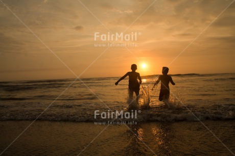 Fair Trade Photo Activity, Beach, Colour image, Friendship, Horizontal, People, Peru, Playing, Sea, Shooting style, Silhouette, South America, Sunset, Two boys