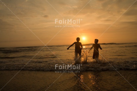 Fair Trade Photo Activity, Beach, Colour image, Friendship, Horizontal, People, Peru, Playing, Sea, Shooting style, Silhouette, South America, Sunset, Two boys