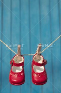 Fair Trade Photo Birth, Colour image, Girl, New baby, People, Peru, Red, Shoe, South America, Vertical, Washingline