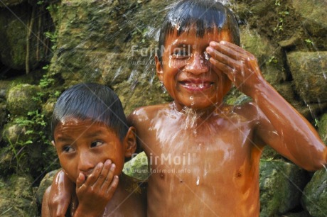 Fair Trade Photo 5-10 years, Activity, Colour image, Day, Horizontal, Hygiene, Latin, Looking at camera, Outdoor, People, Peru, Playing, Portrait halfbody, Rural, Smiling, South America, Two boys, Two children, Washing, Water